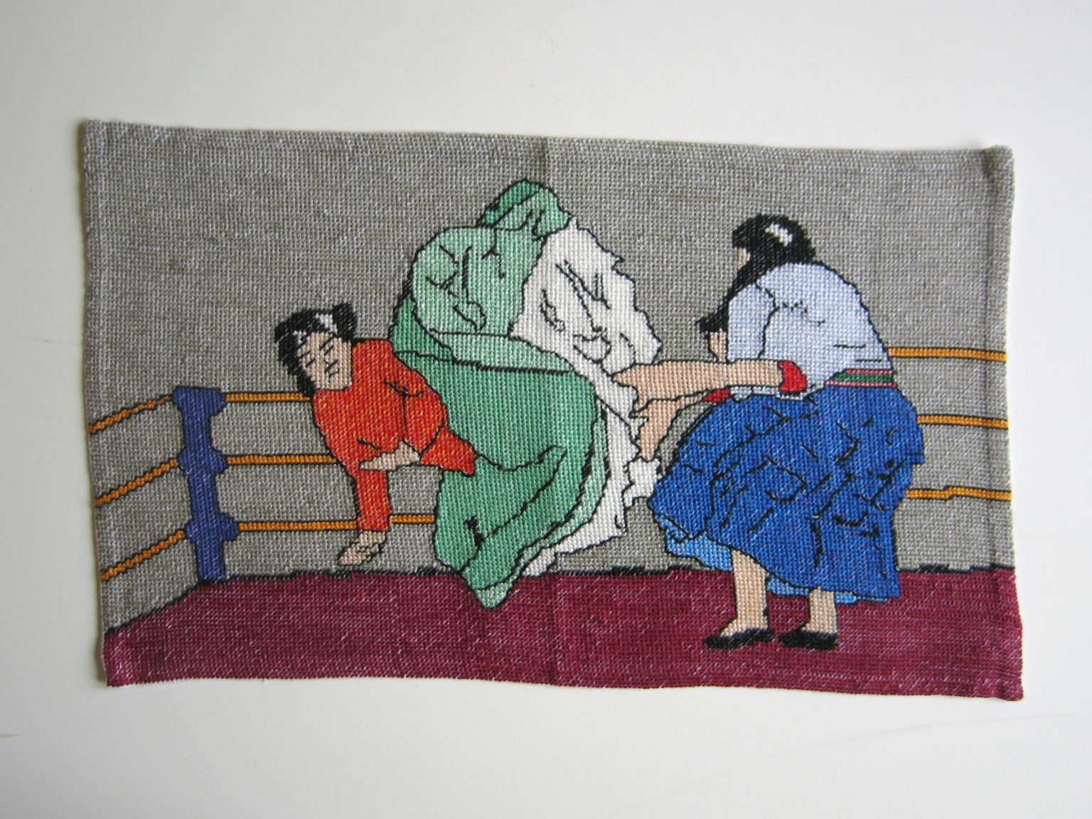 An embroidery by artist and sculptor G. Alexandridis, depicting 2 female Peruvian fighters (cholitas) in the ring. Ένα κέντημα από τον εικαστικό και γλύπτη Γιώργο Αλεξανδρίδη.