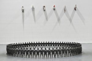 A sculpture by artist and sculptor G. Alexandridis. Glazed clay bodybuilders creating a fence. Ένα γλυπτό από τον εικαστικό και γλύπτη Γ. Αλεξανδρίδη.