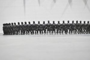 A sculpture by artist and sculptor G. Alexandridis. Glazed clay bodybuilders creating a fence. Ένα γλυπτό από τον εικαστικό και γλύπτη Γ. Αλεξανδρίδη.
