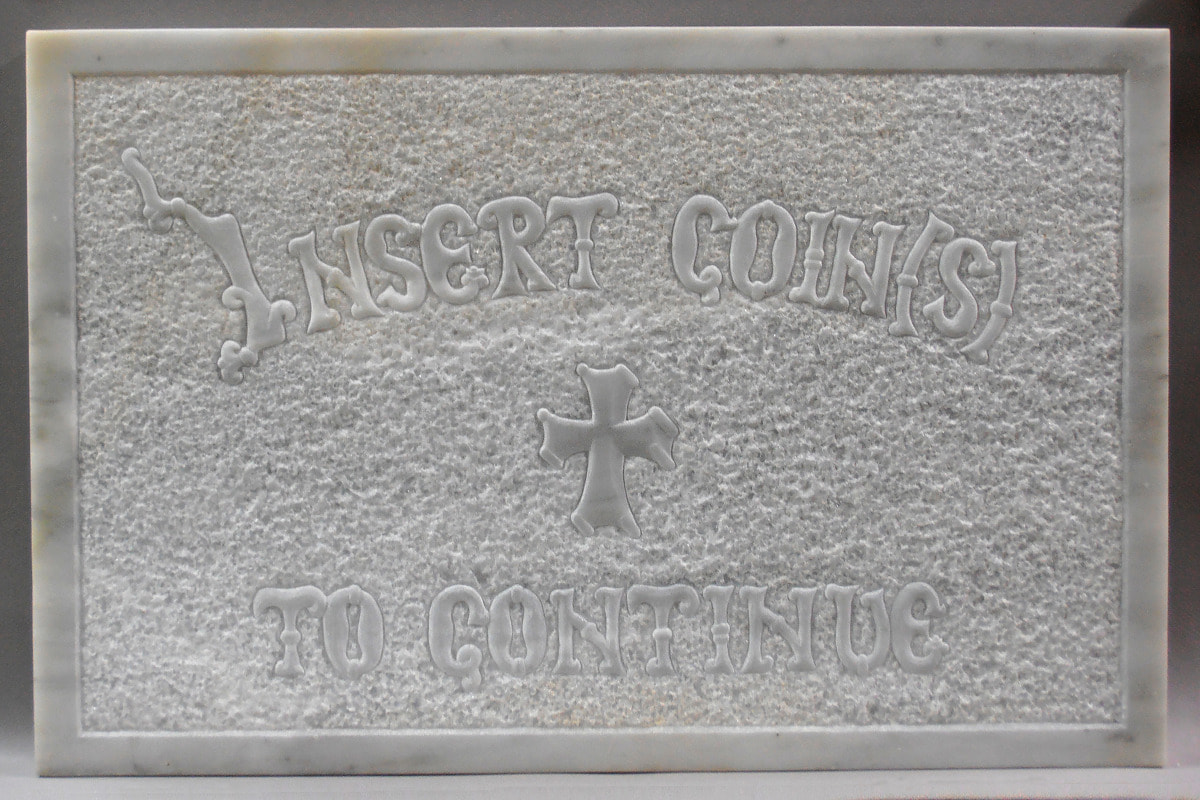 A marble sculpture by artist and sculptor Giorgos Alexandridis. Ένα γλυπτό σε μάρμαρο από τον εικαστικό και γλύπτη Γιώργο Αλεξανδρίδη.